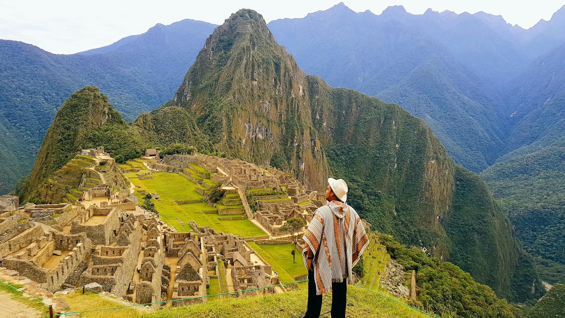 a man in the mountain exploring an ancient ruins